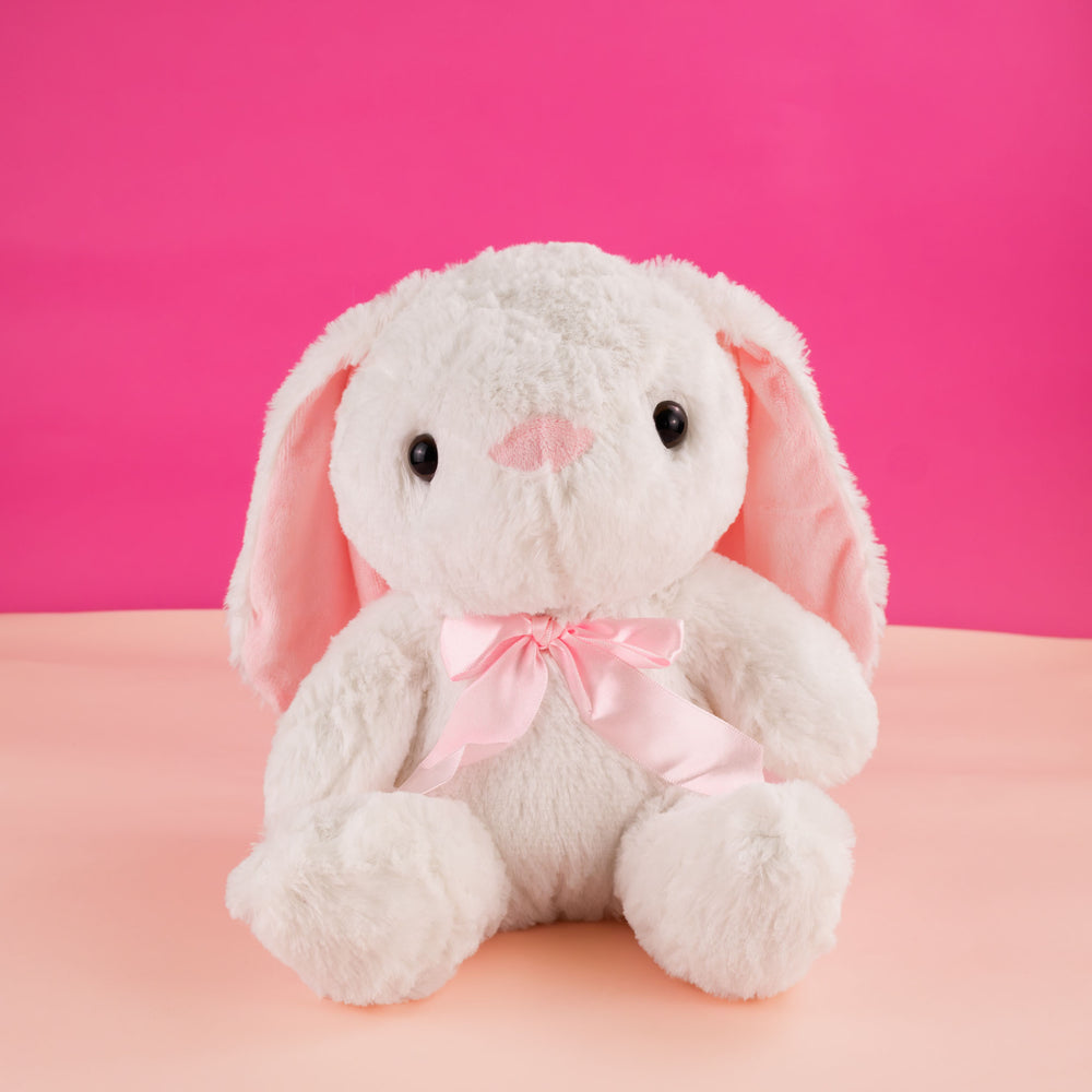conejo de peluche con moño color rosa, perfecto para eventos, decoraciones y reventa