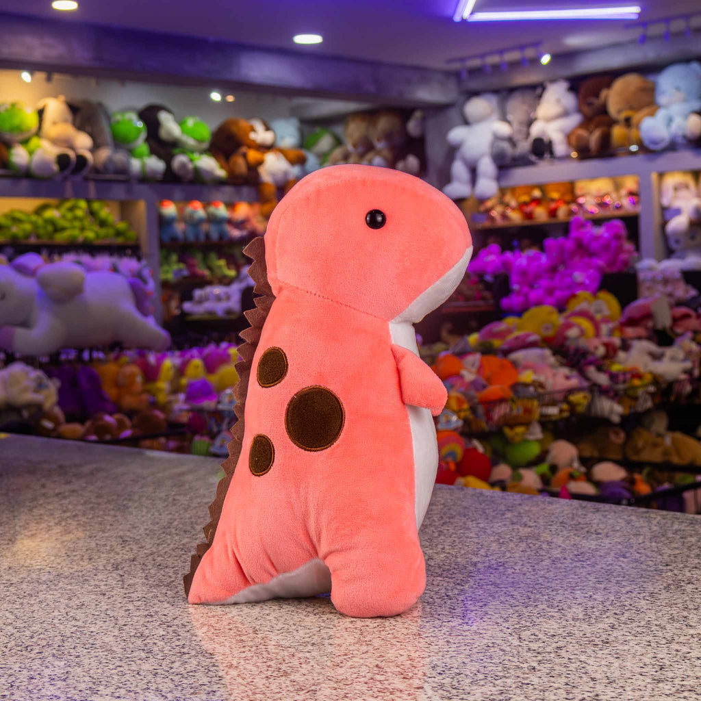 Dinosaurio de peluche tamaño mediano. Ideal para los fanáticos de los animales y para regalar