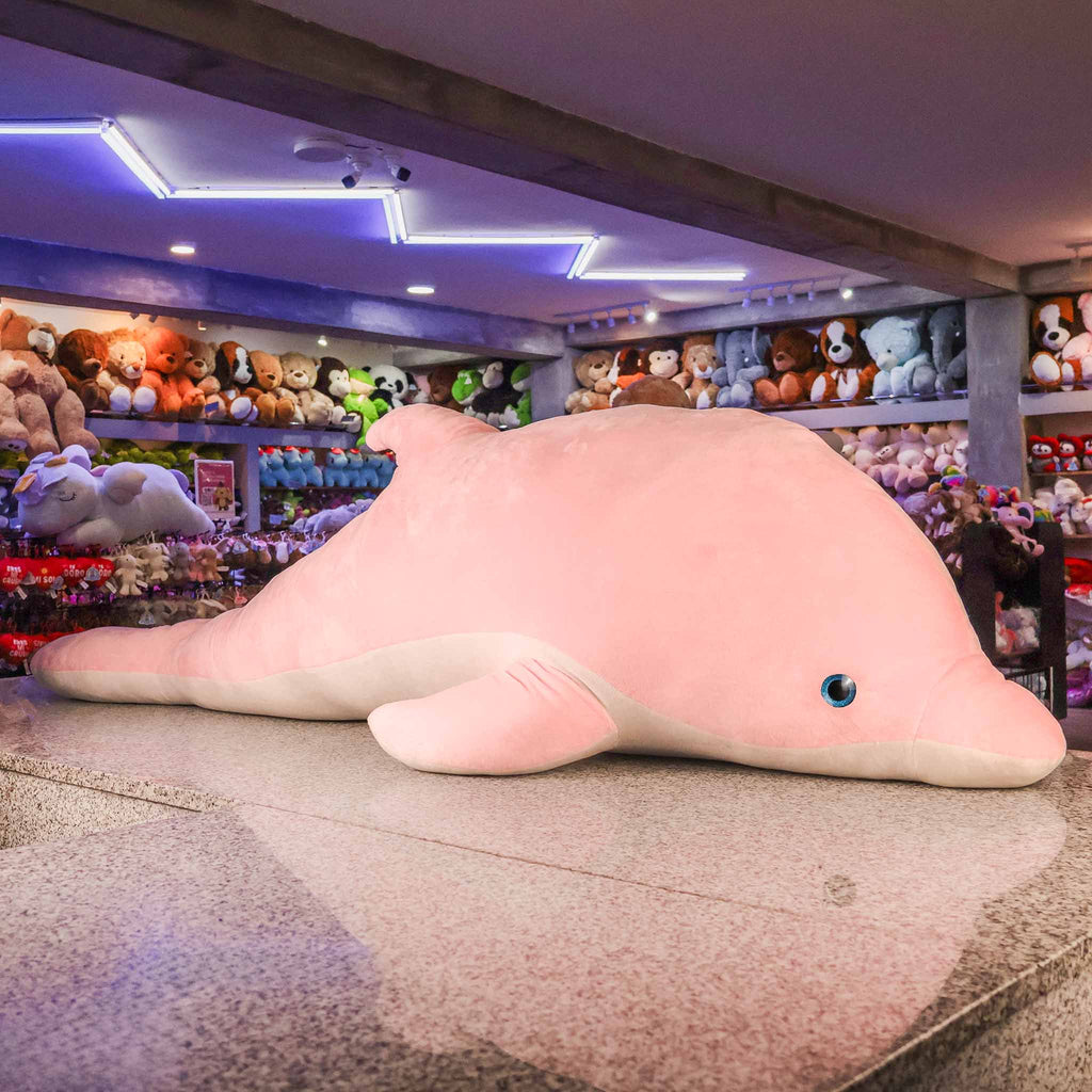 Delfín rosa de peluche gigante, ideal para mayoreo. Distribuidores y mayoristas. Peluches al mayoreo 