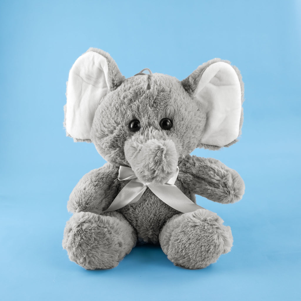 Elefante de peluche gris con orejas grandes y trompa suave, perfecto para toda ocasión
