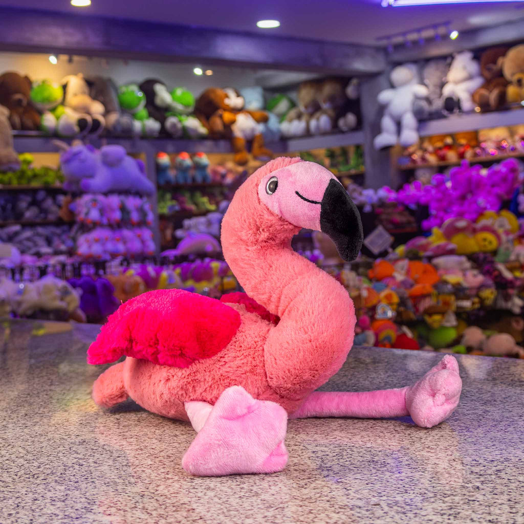 Flamingo de peluche color rosa, con detalles negros, ideal para tiendas de regalo y mayoristas