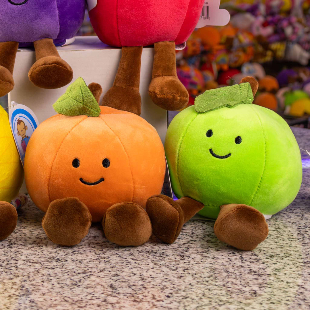 Frutas y comida de peluche al mayoreo. Colores surtidos con caritas felices 