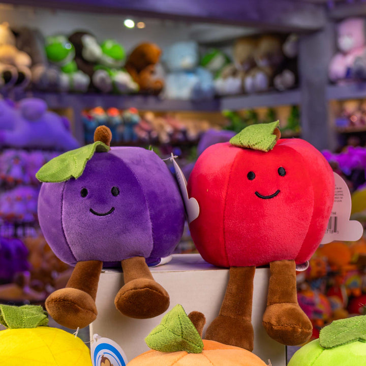 Frutas y comida de peluche al mayoreo. Colores surtidos con caritas felices 