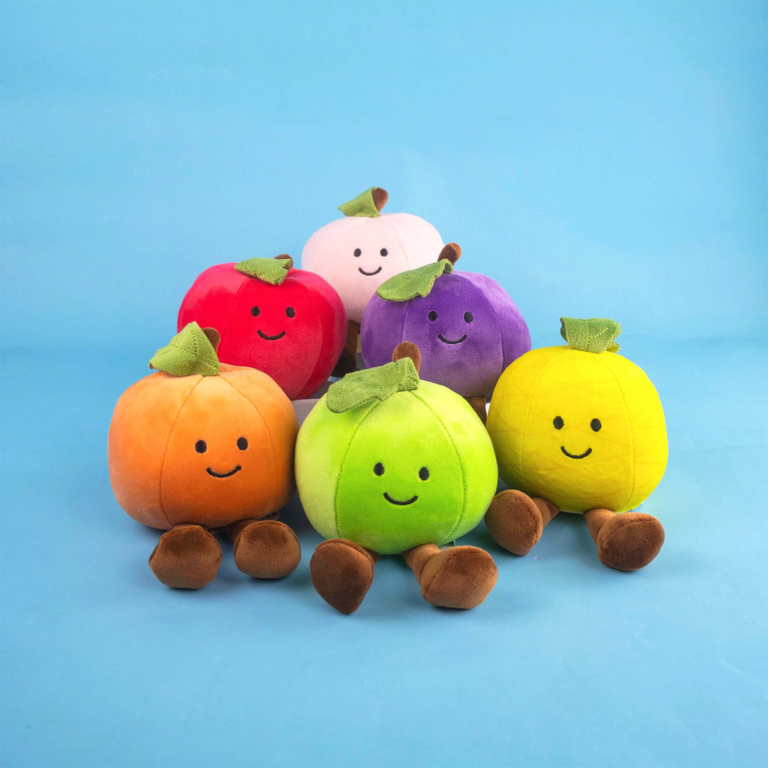 Frutas y comida de peluche al mayoreo. Colores surtidos con caritas felices 