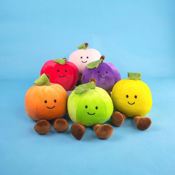Frutas y comida de peluche al mayoreo. Colores surtidos con caritas felices 