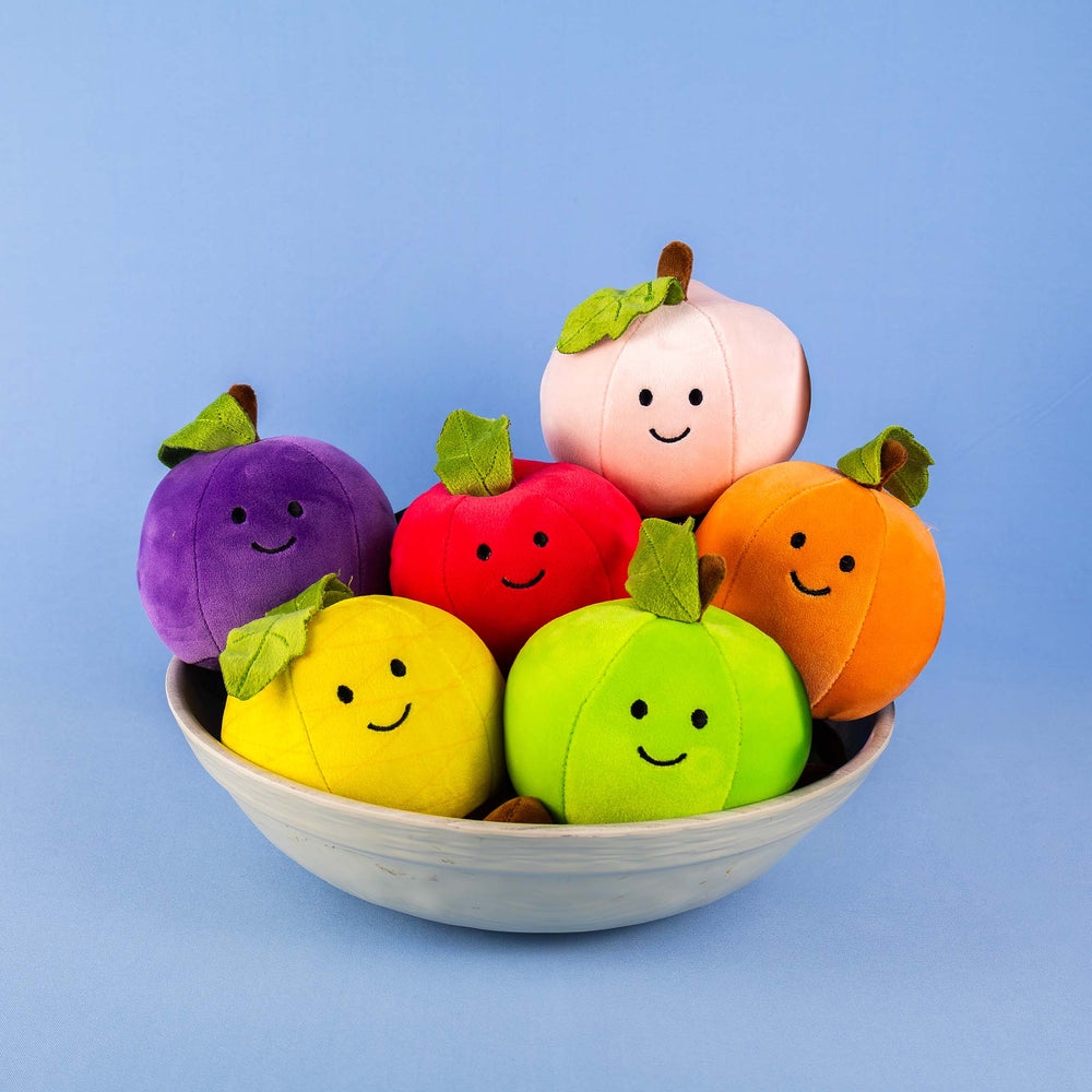 Frutas y comida de peluche al mayoreo. Colores surtidos con caritas felices 