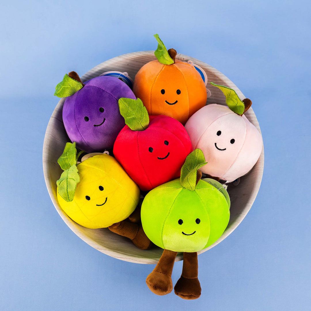Frutas y comida de peluche al mayoreo. Colores surtidos con caritas felices 