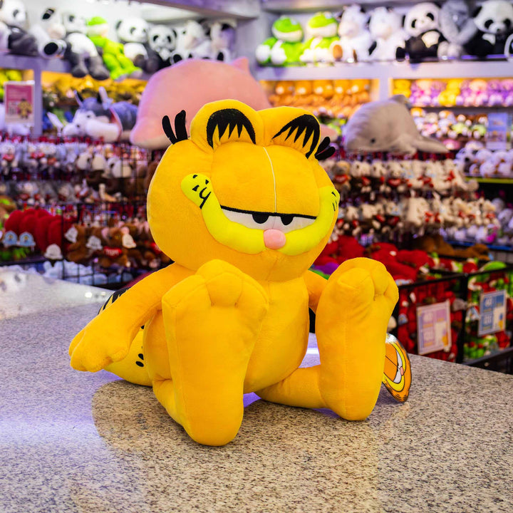 Garfield de peluche original. Peluches de licencias, color naranja con negro