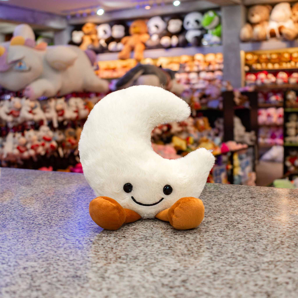 Luna de peluche Luni 16 cm PIUINIKI , color blanco y carita feliz. Peluches para regalar