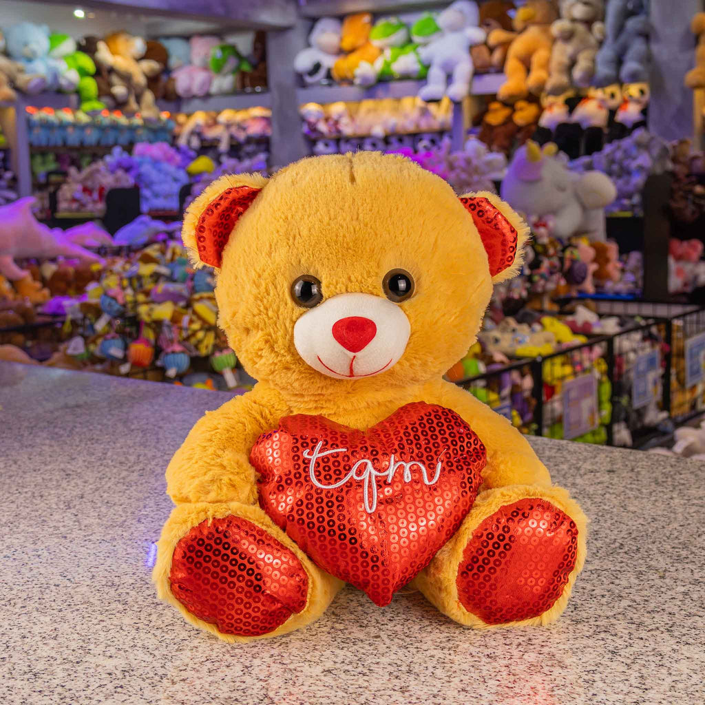 Oso de peluche con corazón ideal para San Valentín , suave y abrazable . Tiendas de regalos y distribuidores 