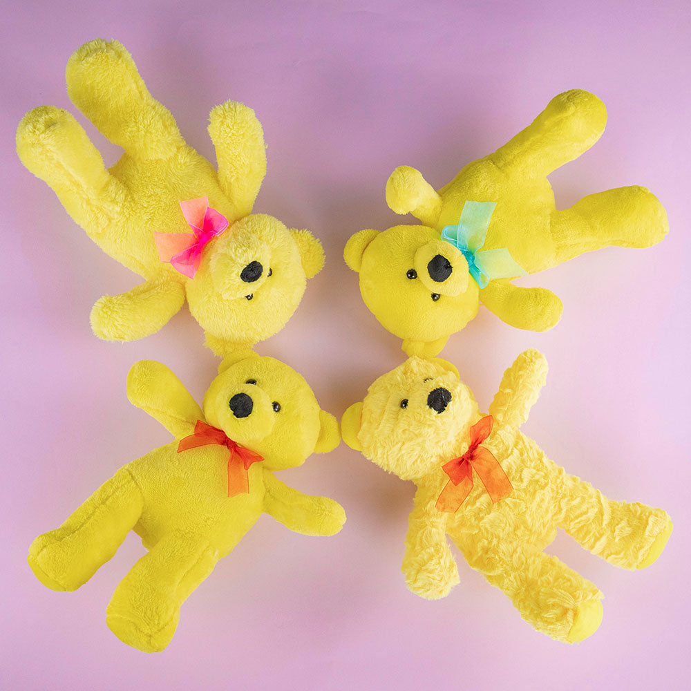 Oso de peluche color amarillo brillante y suave, ideal como regalo alegre y tierno
