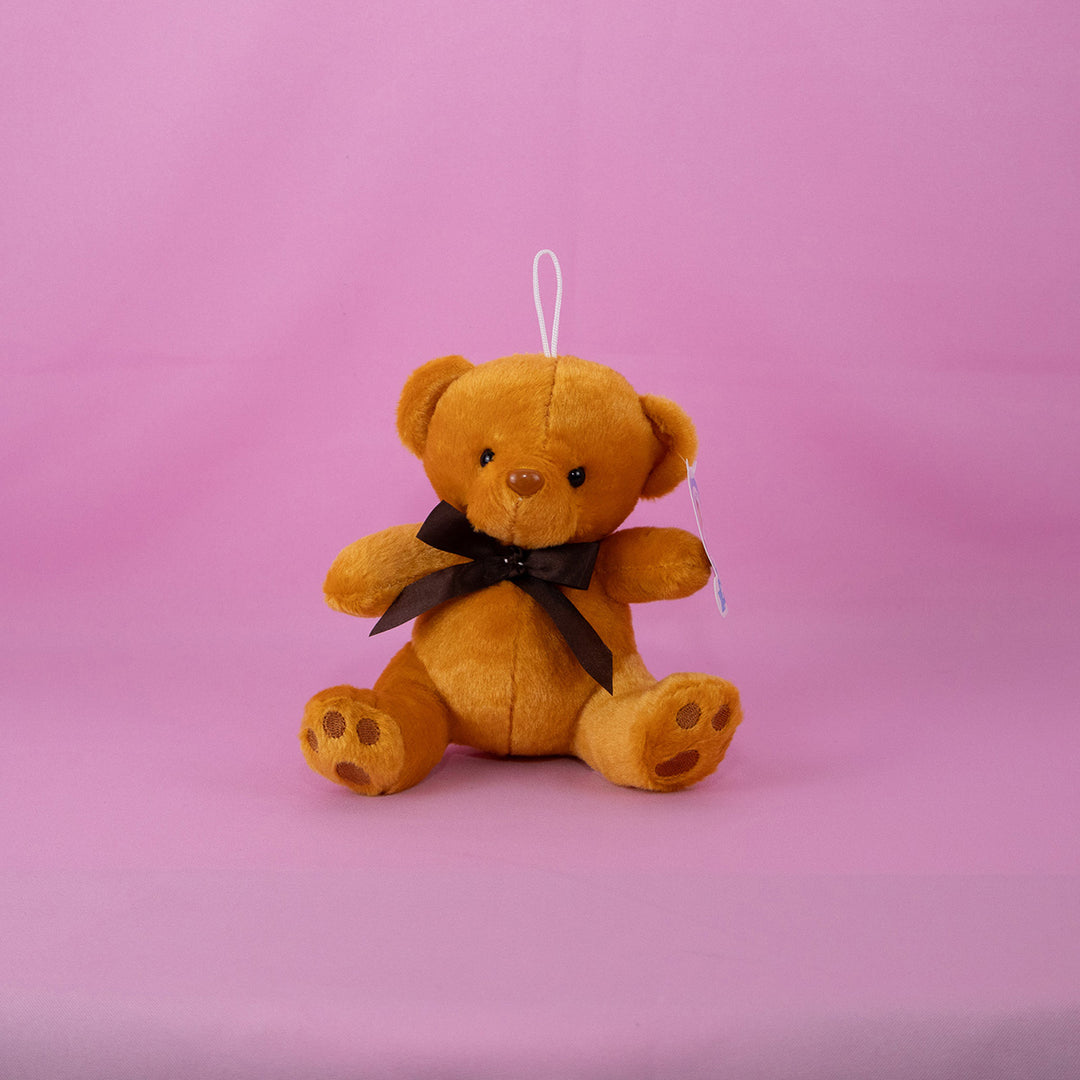Osos de peluche al mayoreo en colores blanco y café, perfectos para decoración y eventos