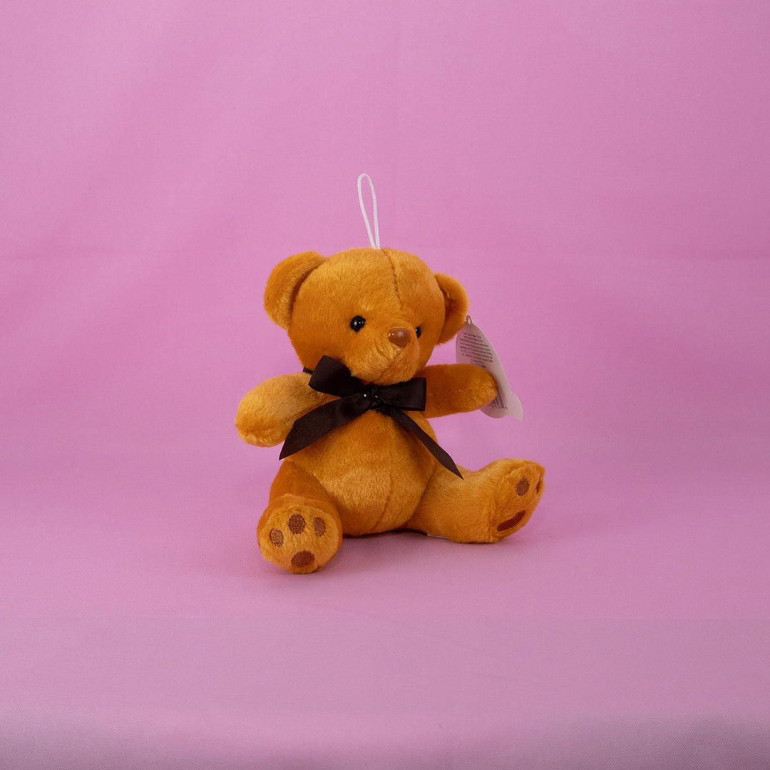 Osos de peluche al mayoreo en colores blanco y café, perfectos para decoración y eventos