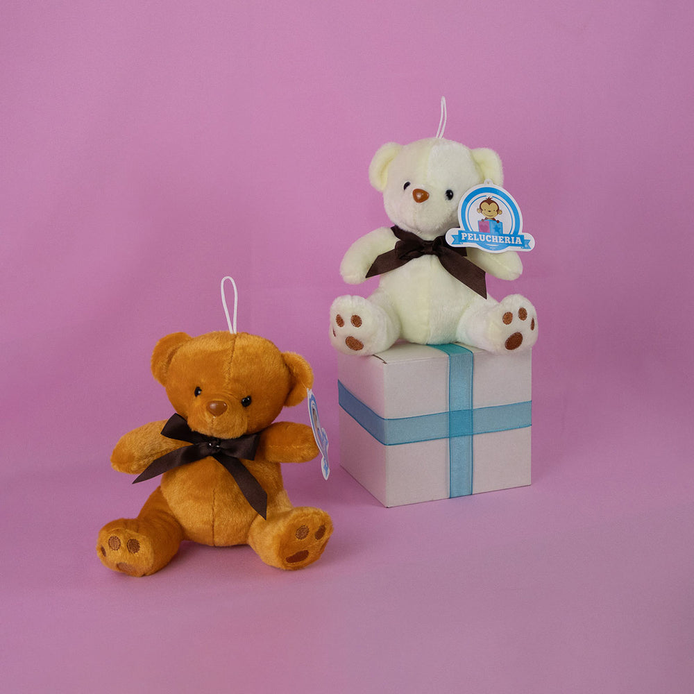 Osos de peluche al mayoreo en colores blanco y café, perfectos para decoración y eventos