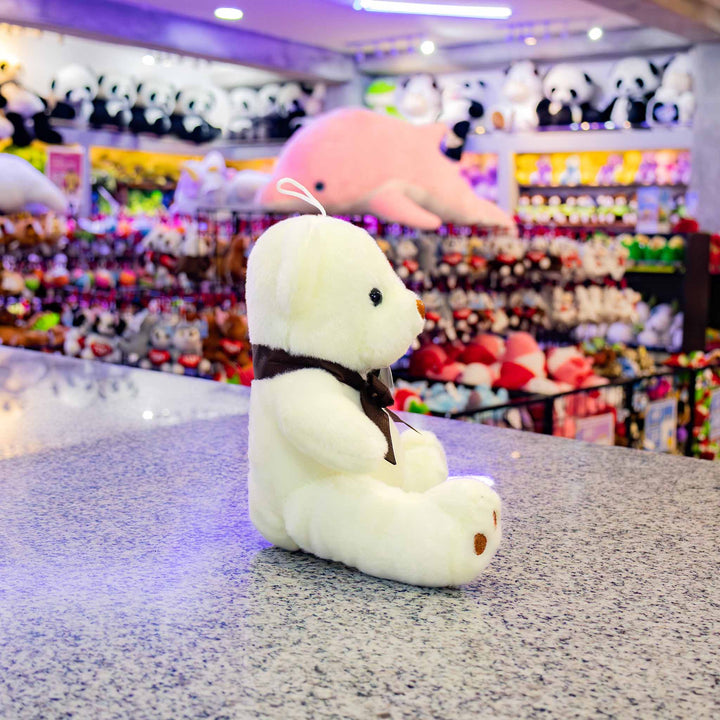 Osos de peluche al mayoreo en colores blanco y café, perfectos para decoración y eventos