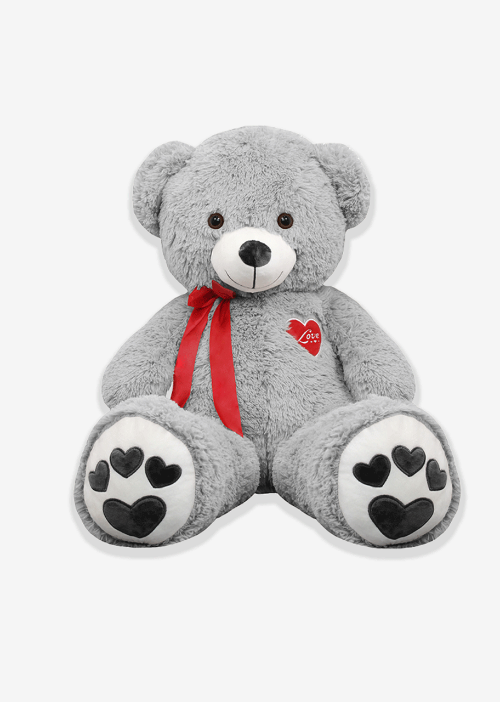 Oso de peluche gris con corazón rojo, suave y romántico, ideal para regalo y venta en mayoreo.