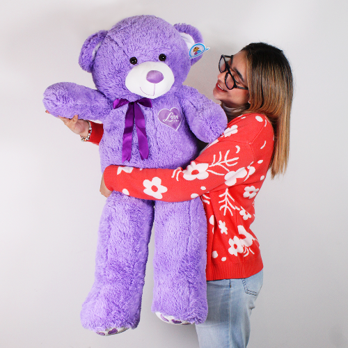 Oso de peluche morado, suave y esponjoso, ideal para regalo o venta en mayoreo.