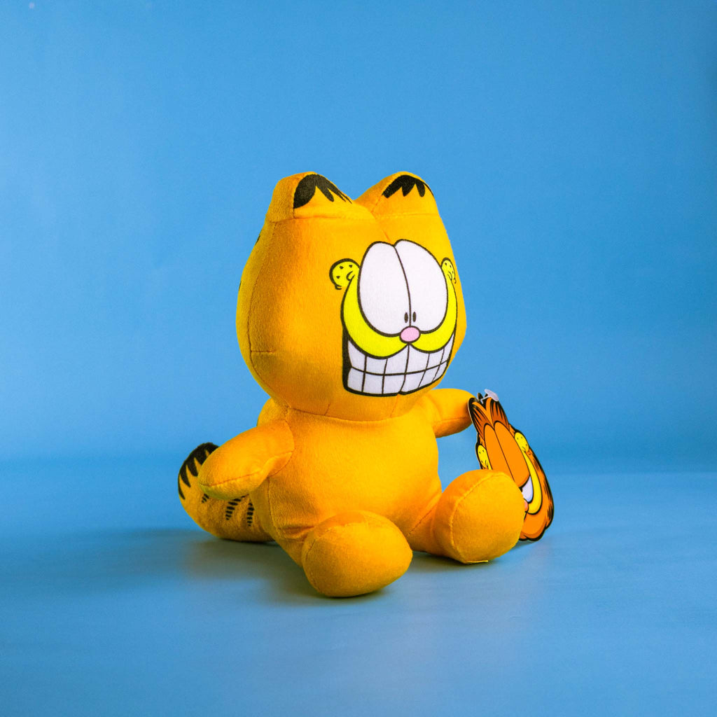 Garfield de peluche original para fanáticos, súper adorable.
