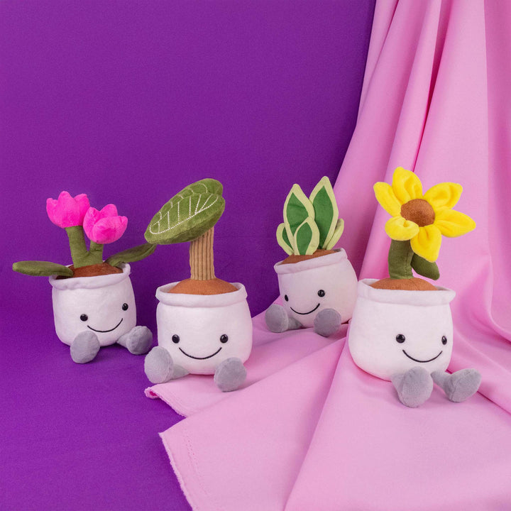 Planta de peluche Kumba 23 cm PIUINIKI - Pelucheria. Peluche de planta con carita feliz en color verde