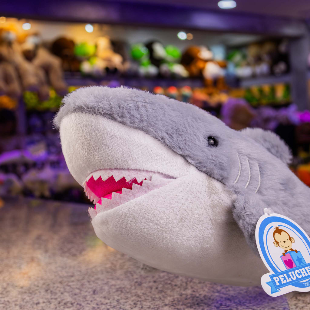 Tiburón de peluche  con detalles brillantes. Ideal para distribuidores. Variedad y materiales de calidad