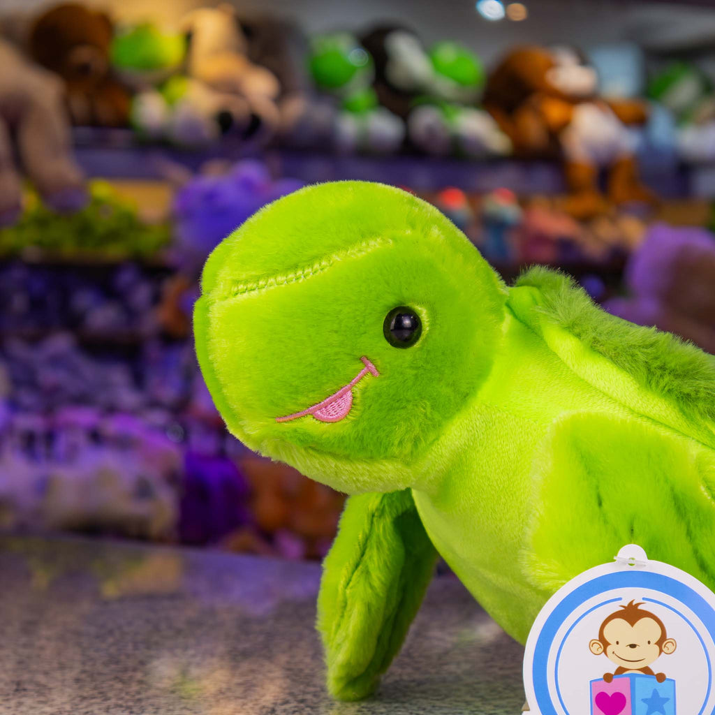 Tortuga de peluche al mayoreo, con detalles brillantes. Ideal para distribuidores. Variedad y materiales de calidad
