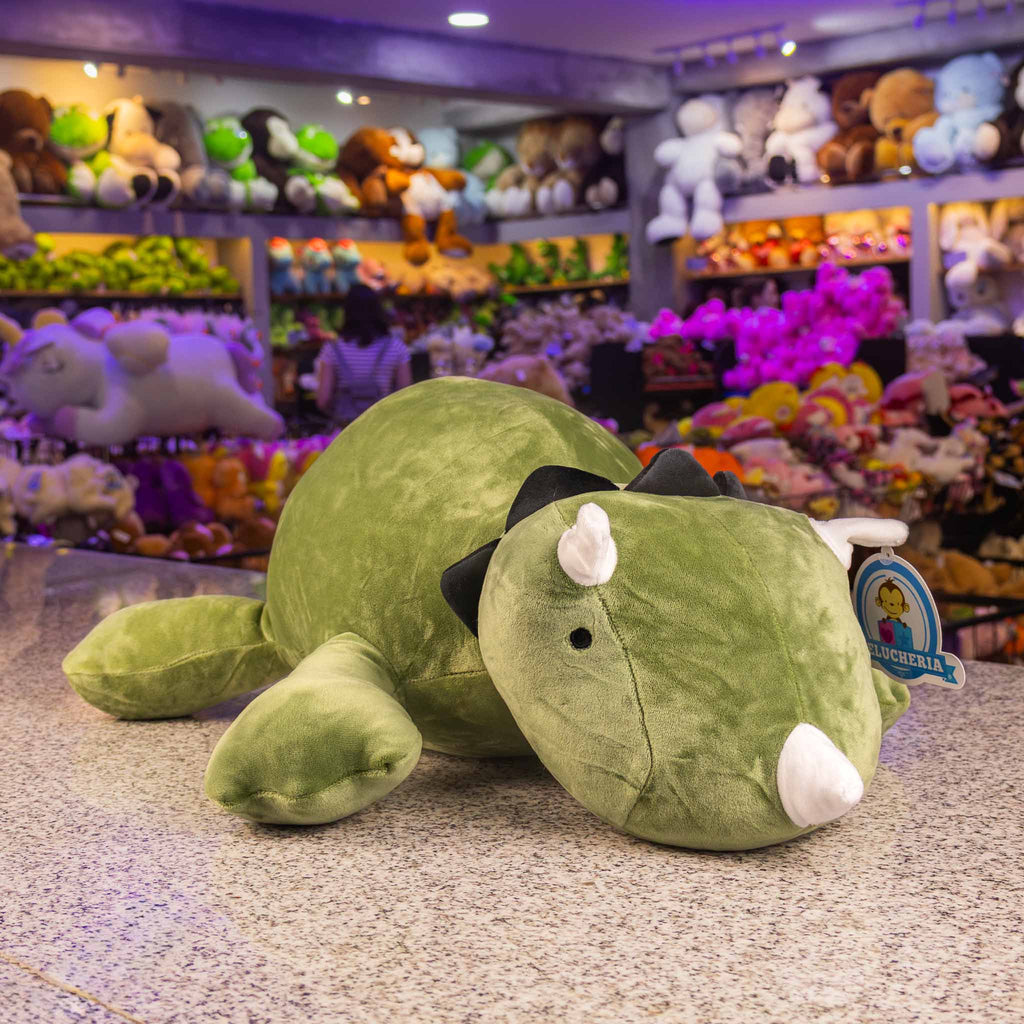 Dinosaurio de peluche tamaño mediano. Ideal para los fanáticos de los animales y para regalar