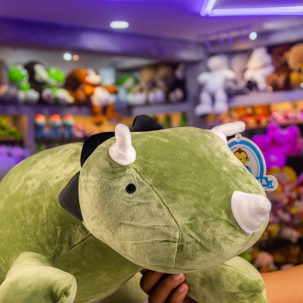 Dinosaurio de peluche tamaño mediano. Ideal para los fanáticos de los animales y para regalar