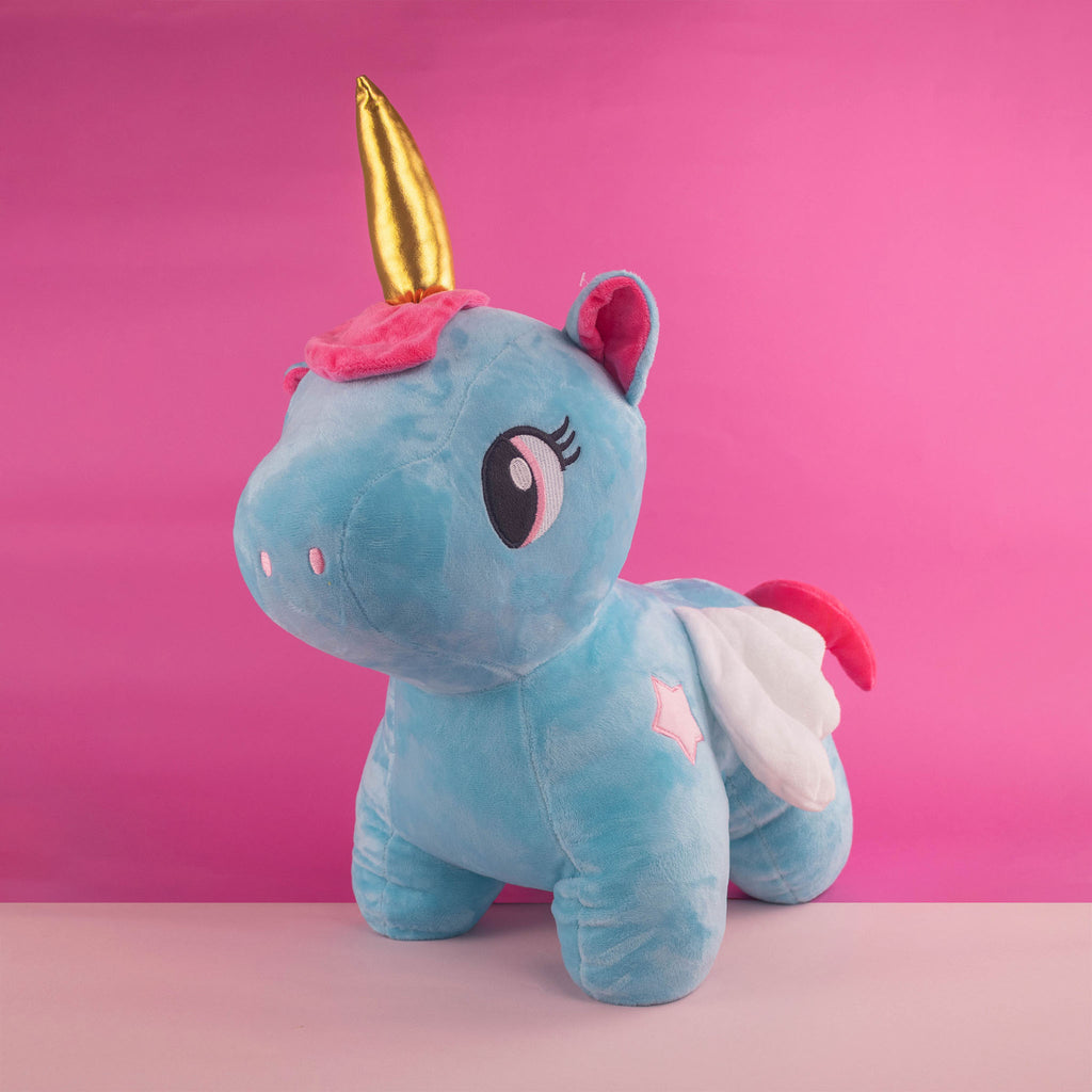 Unicornio de peluche color azul con detalles brillantes, ideal para tiendas de regalos y mayoristas