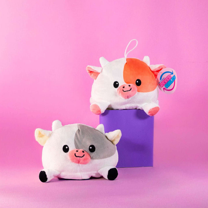 vaca de peluche reversibles en colores surtidos. Peluches de novedad y de moda