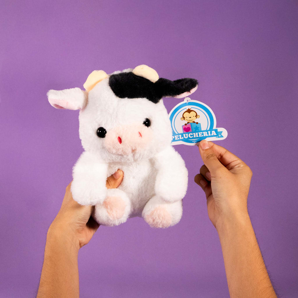 Vacas de peluche al mayoreo, colores negro y blanco. Perfectas para regalar, decorar o vender.