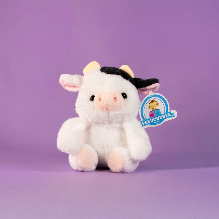 Vacas de peluche al mayoreo, colores negro y blanco. Perfectas para regalar, decorar o vender.