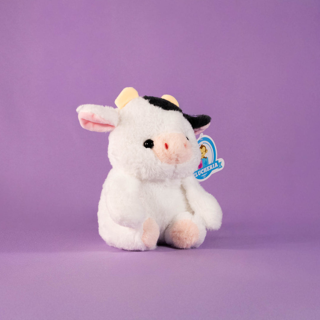 Vacas de peluche al mayoreo, colores negro y blanco. Perfectas para regalar, decorar o vender.