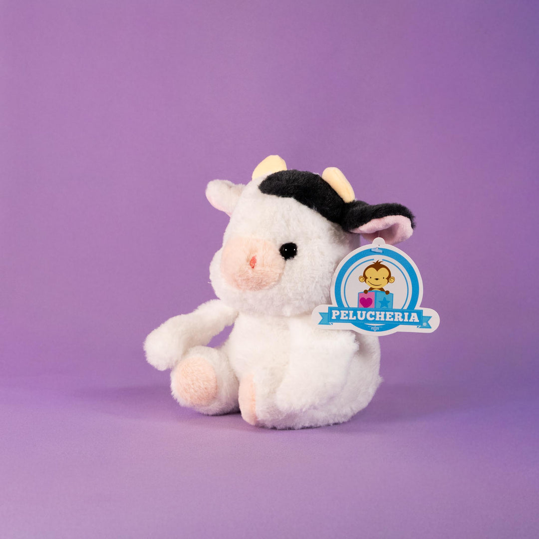 Vacas de peluche al mayoreo, colores negro y blanco. Perfectas para regalar, decorar o vender.