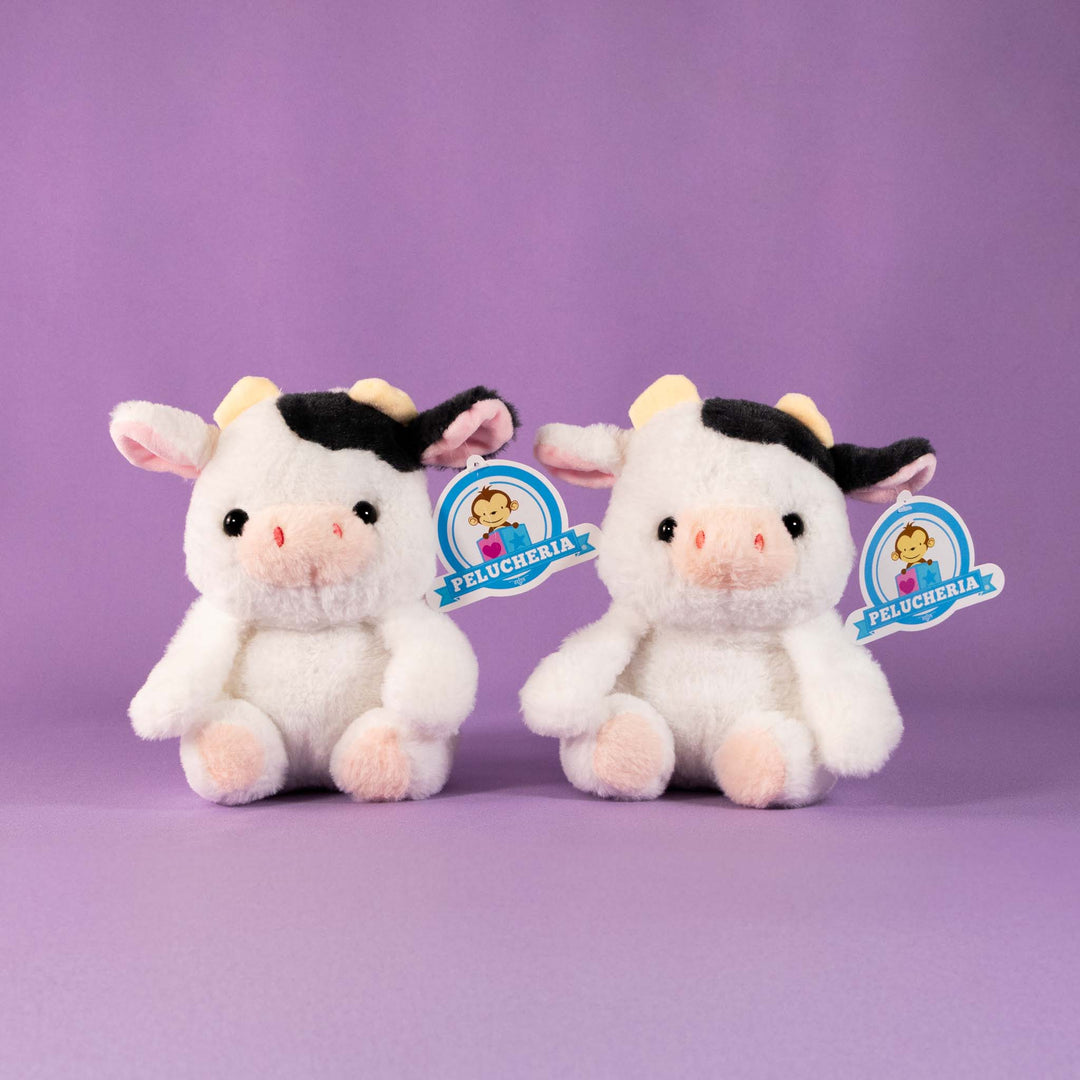 Vacas de peluche al mayoreo, colores negro y blanco. Perfectas para regalar, decorar o vender.