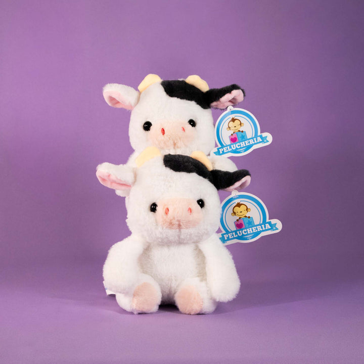 Vacas de peluche al mayoreo, colores negro y blanco. Perfectas para regalar, decorar o vender.