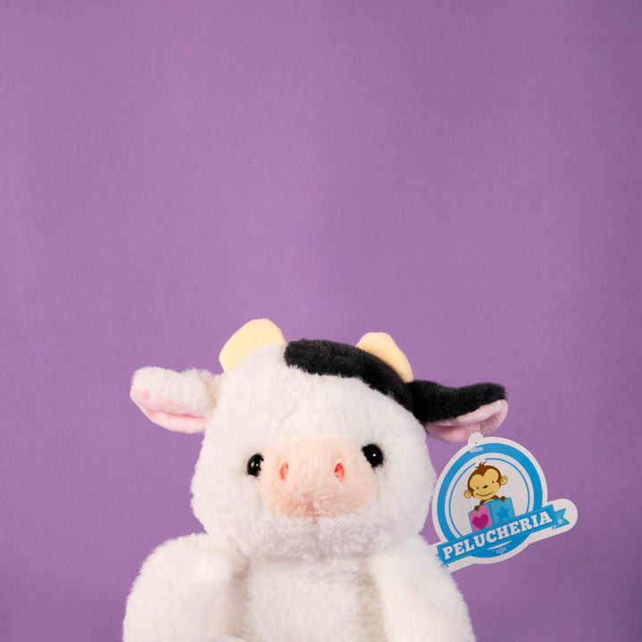 Vacas de peluche al mayoreo, colores negro y blanco. Perfectas para regalar, decorar o vender.