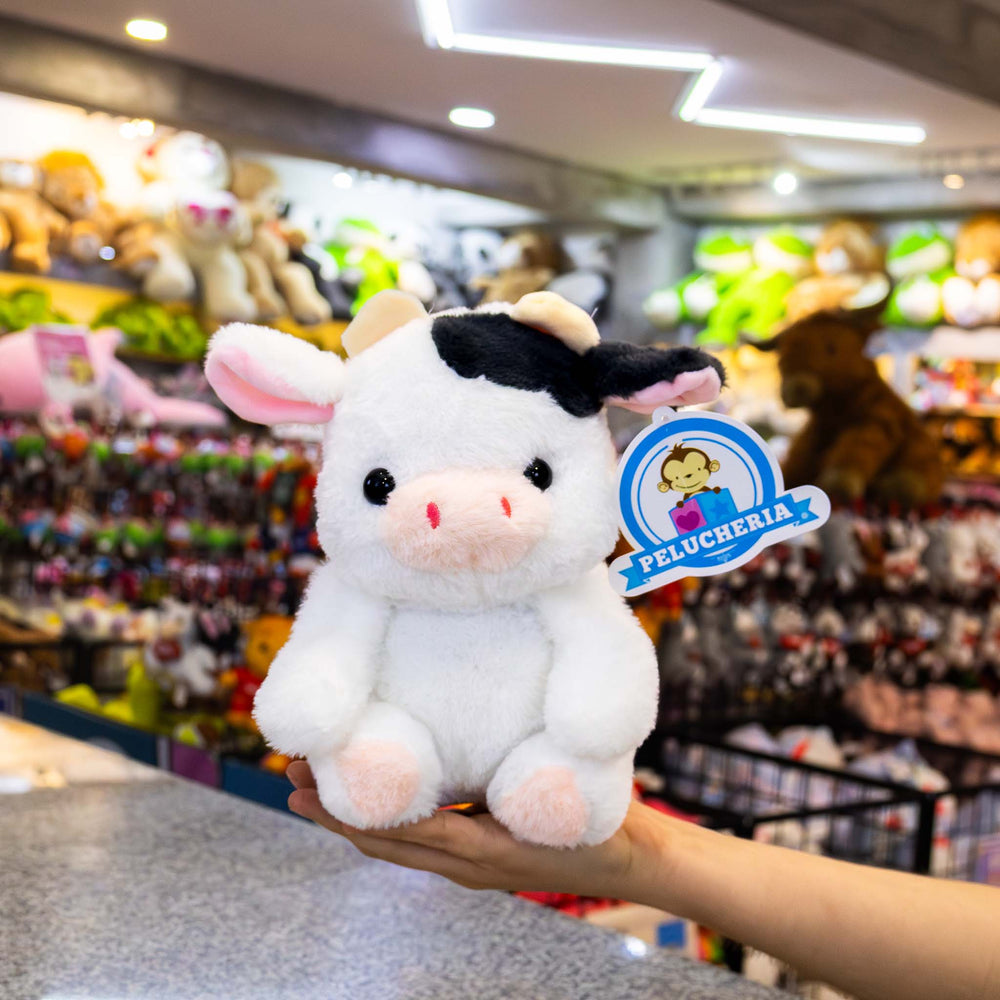 Vacas de peluche al mayoreo, colores negro y blanco. Perfectas para regalar, decorar o vender.