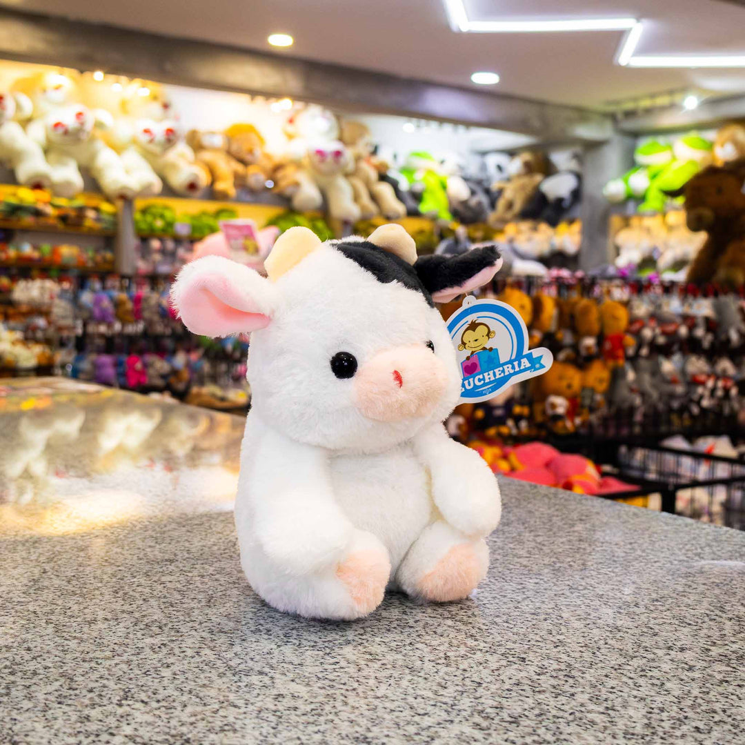 Vacas de peluche al mayoreo, colores negro y blanco. Perfectas para regalar, decorar o vender.