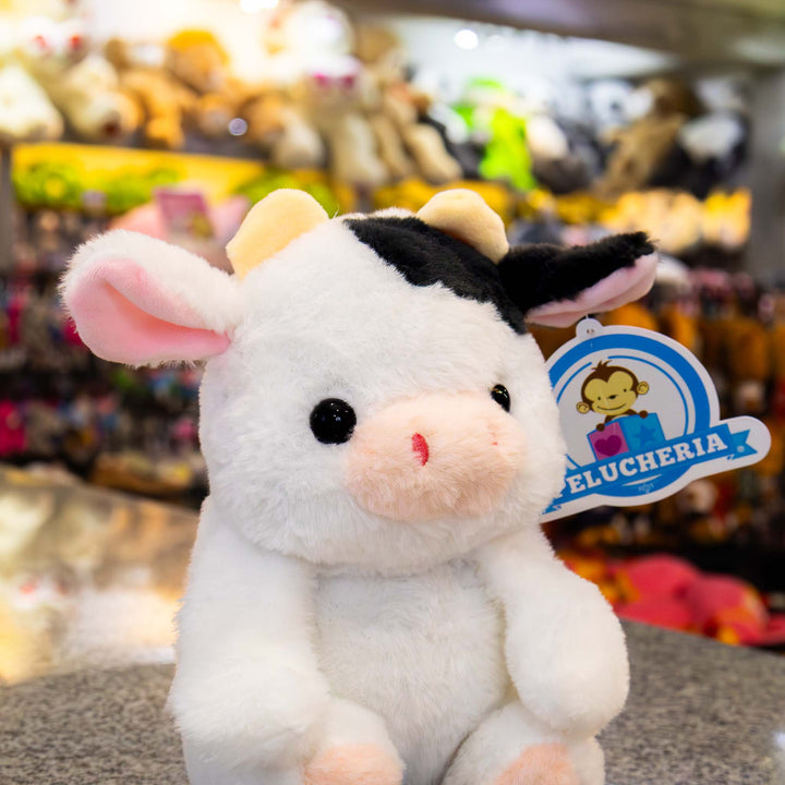 Vacas de peluche al mayoreo, colores negro y blanco. Perfectas para regalar, decorar o vender.