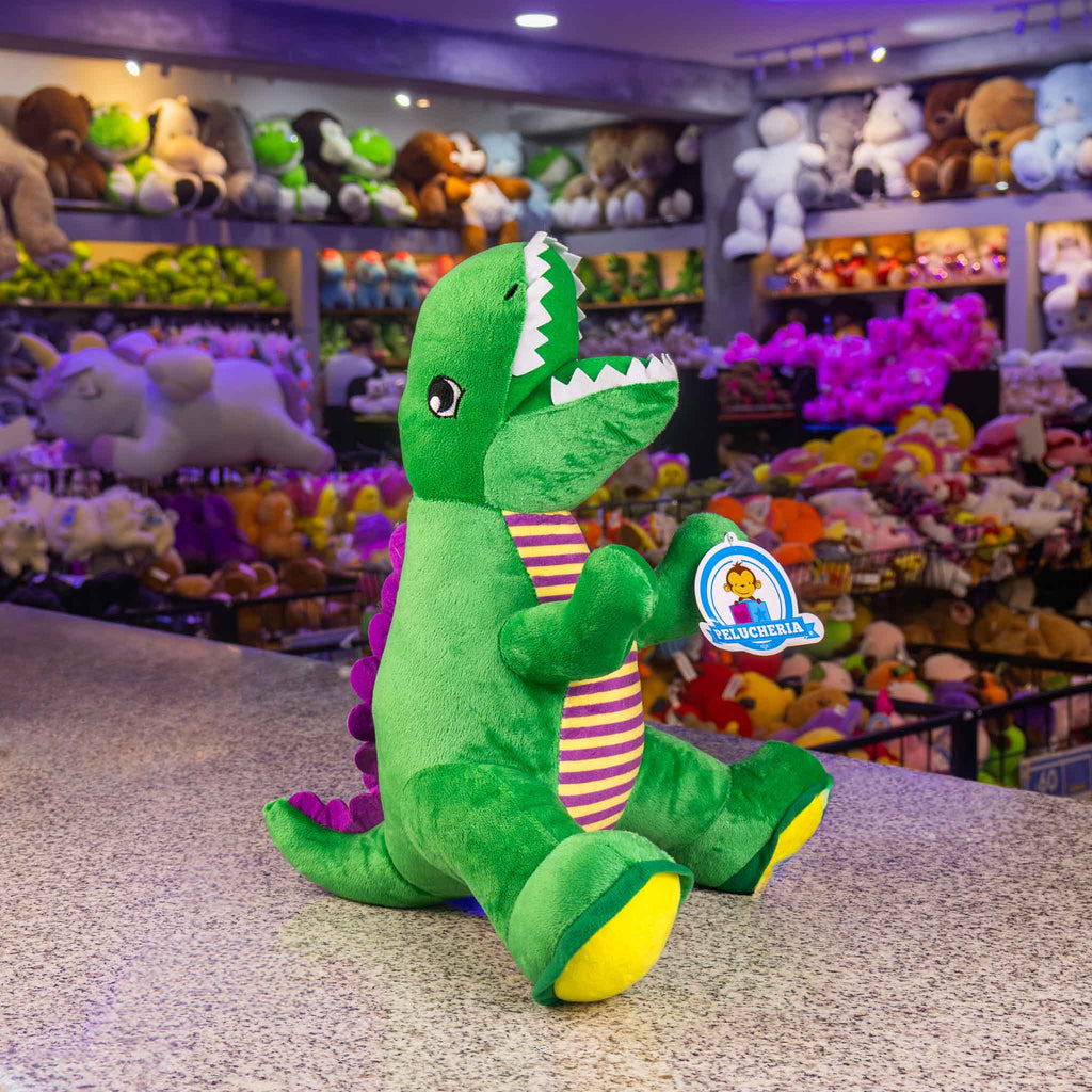 Dinosaurio de peluche tamaño mediano. Ideal para los fanáticos de los animales y para regalar