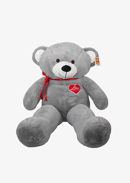 Oso de peluche meli super suave de color gris, ideal para regalos en cualrquier ocasión, en san valentin, regalar amor o decorar un espacio con un osito adorable.