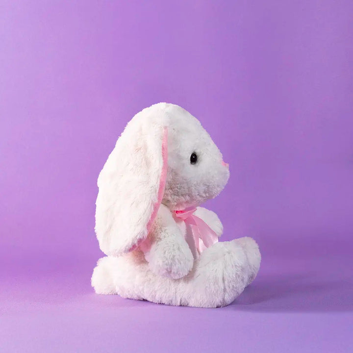 conejo de peluche con moño color rosa, perfecto para eventos, decoraciones y reventa