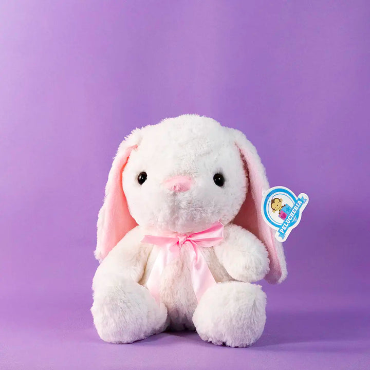 conejo de peluche con moño color rosa, perfecto para eventos, decoraciones y reventa