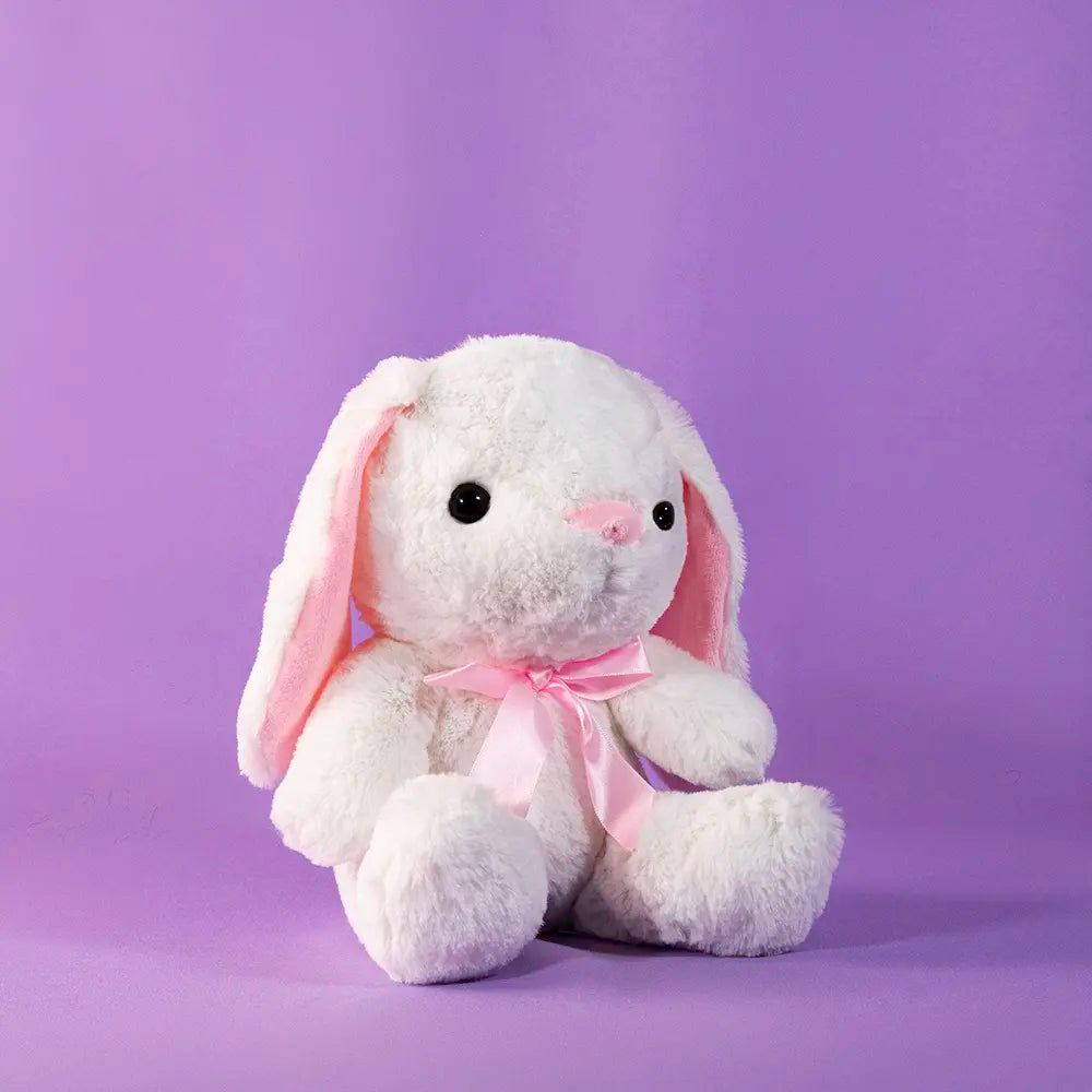 conejo de peluche con moño color rosa, perfecto para eventos, decoraciones y reventa