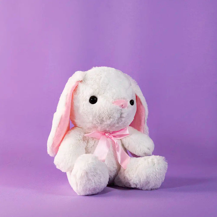 conejo de peluche con moño color rosa, perfecto para eventos, decoraciones y reventa