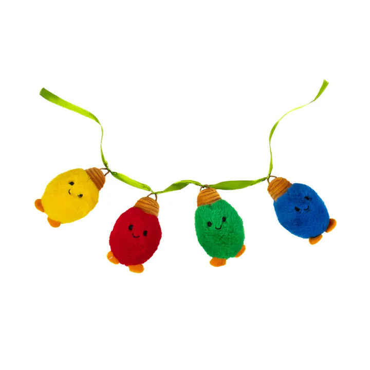 Paquete de 4 piezas Foquitos navideños luces de peluche 11 cm
