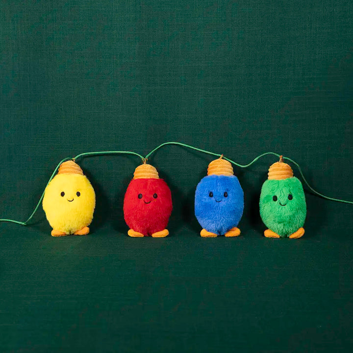 Paquete de 4 piezas Foquitos navideños luces de peluche 11 cm
